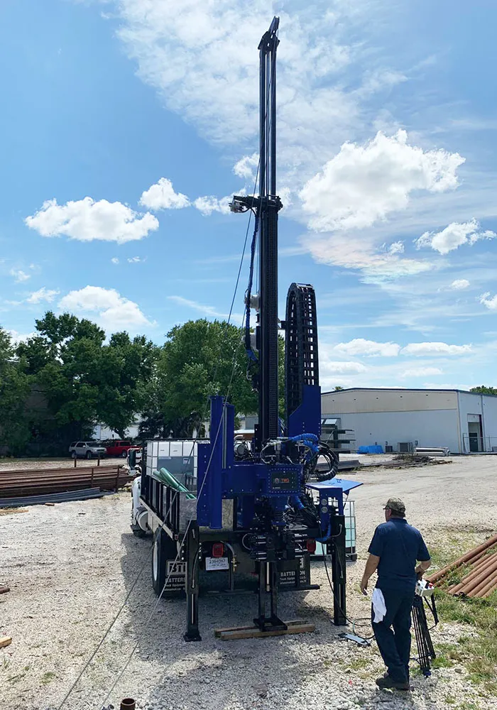 Our flatbed truck mounted drill rig comes with a remote pendant for drilling operations